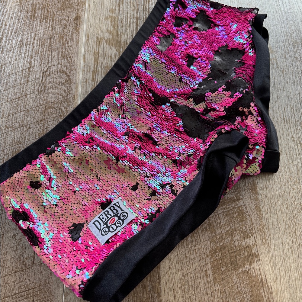 New never worn Derby Kiss hot pink/Black sequin shorts